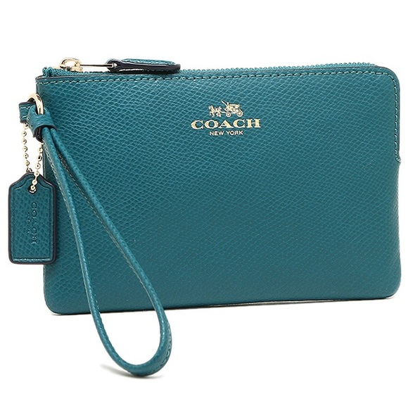 Coach Handbags - HP!! NWOT Coach Authentic Teal Wristlet